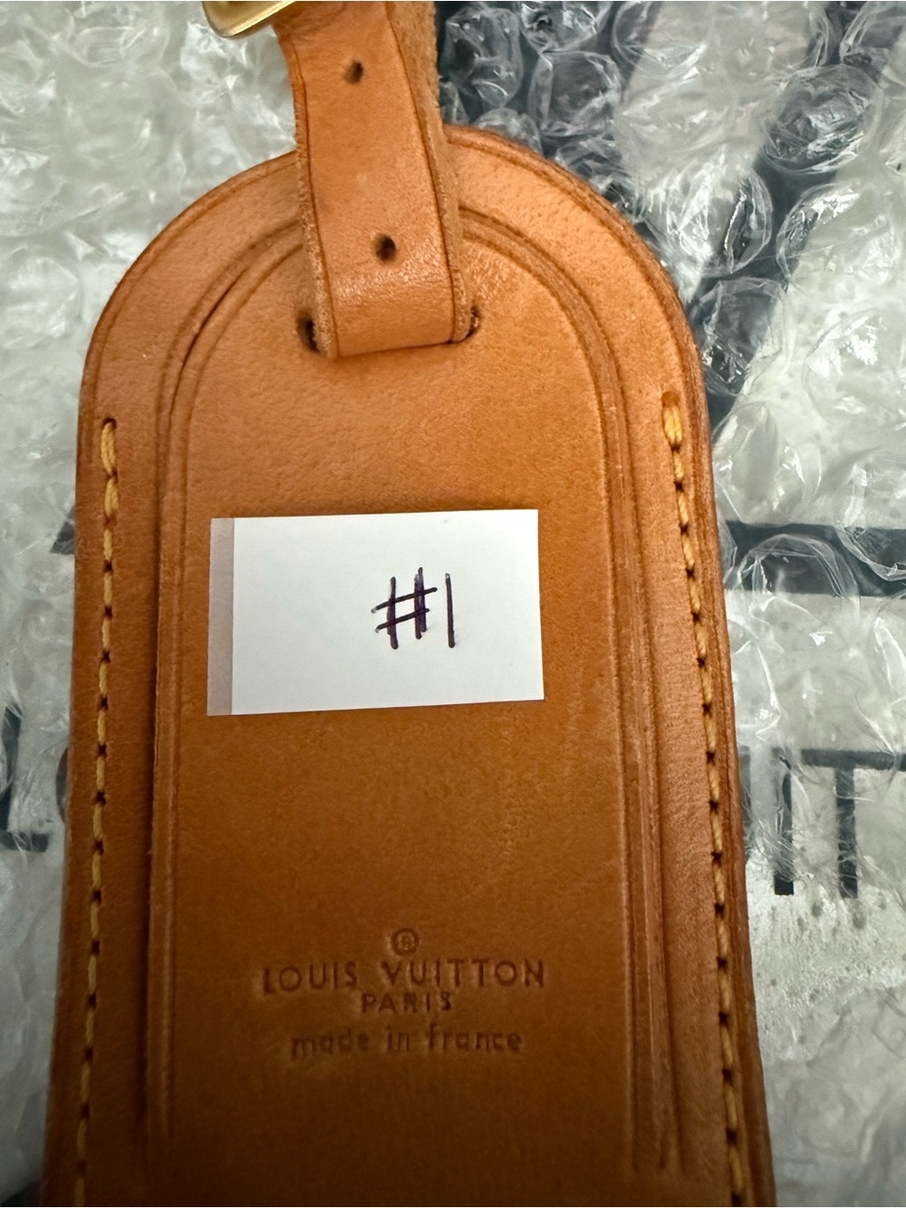 Louis Vuitton Leather Luggage Tag in Tan